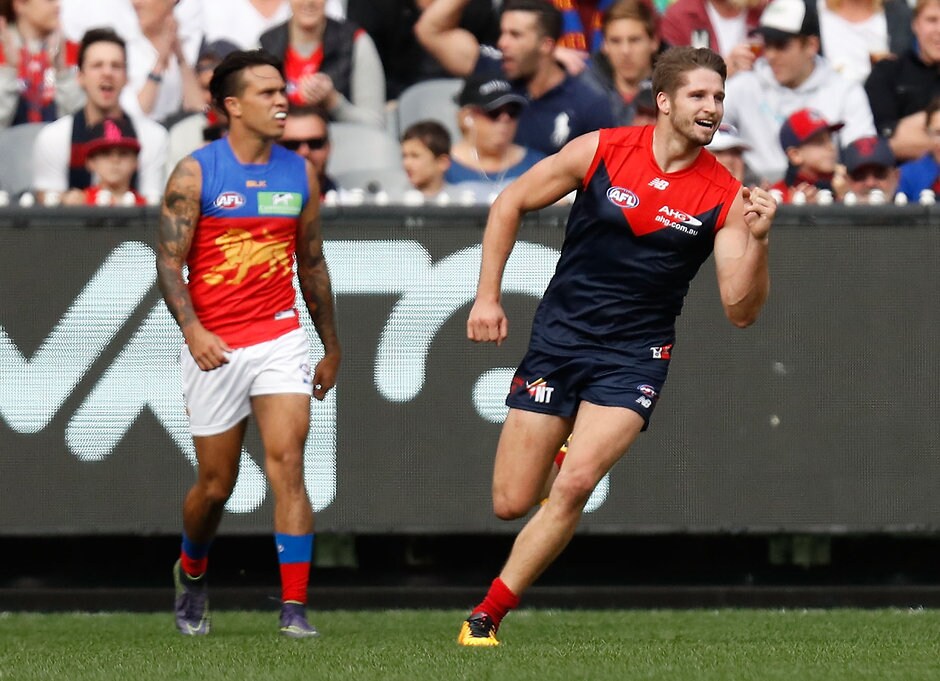 AFL 2016 Rd 09 - Melbourne v Brisbane MELBOURNE, AUSTRALIA - MAY 22: Jesse Hogan of the Demons celebrates a goal during the 2016 AFL Round 09 match between the Melbourne Demons and the Brisbane Lions at the Melbourne Cricket Ground on May 22, 2016 in Melbourne, Australia. (Photo by Michael Willson/AFL Media)
